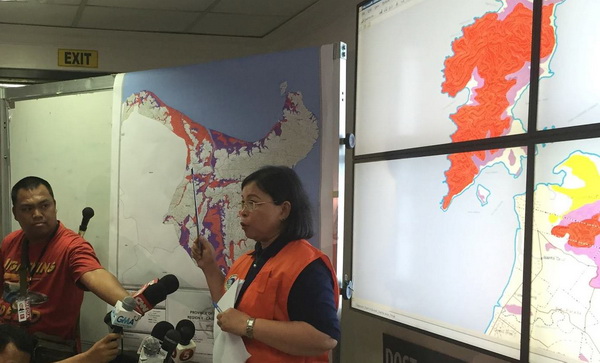 MGB OIC-Chief Geologist Lilian A. Rollan explains the rain-induced landslide